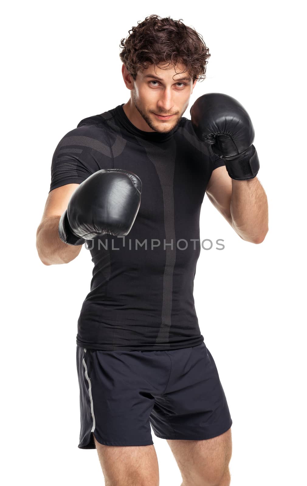 Athletic attractive man wearing boxing gloves on the white background