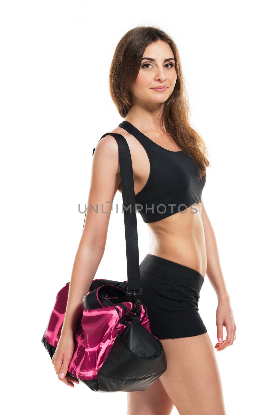 Portrait of attractive caucasian smiling woman with sports bag isolated on white background