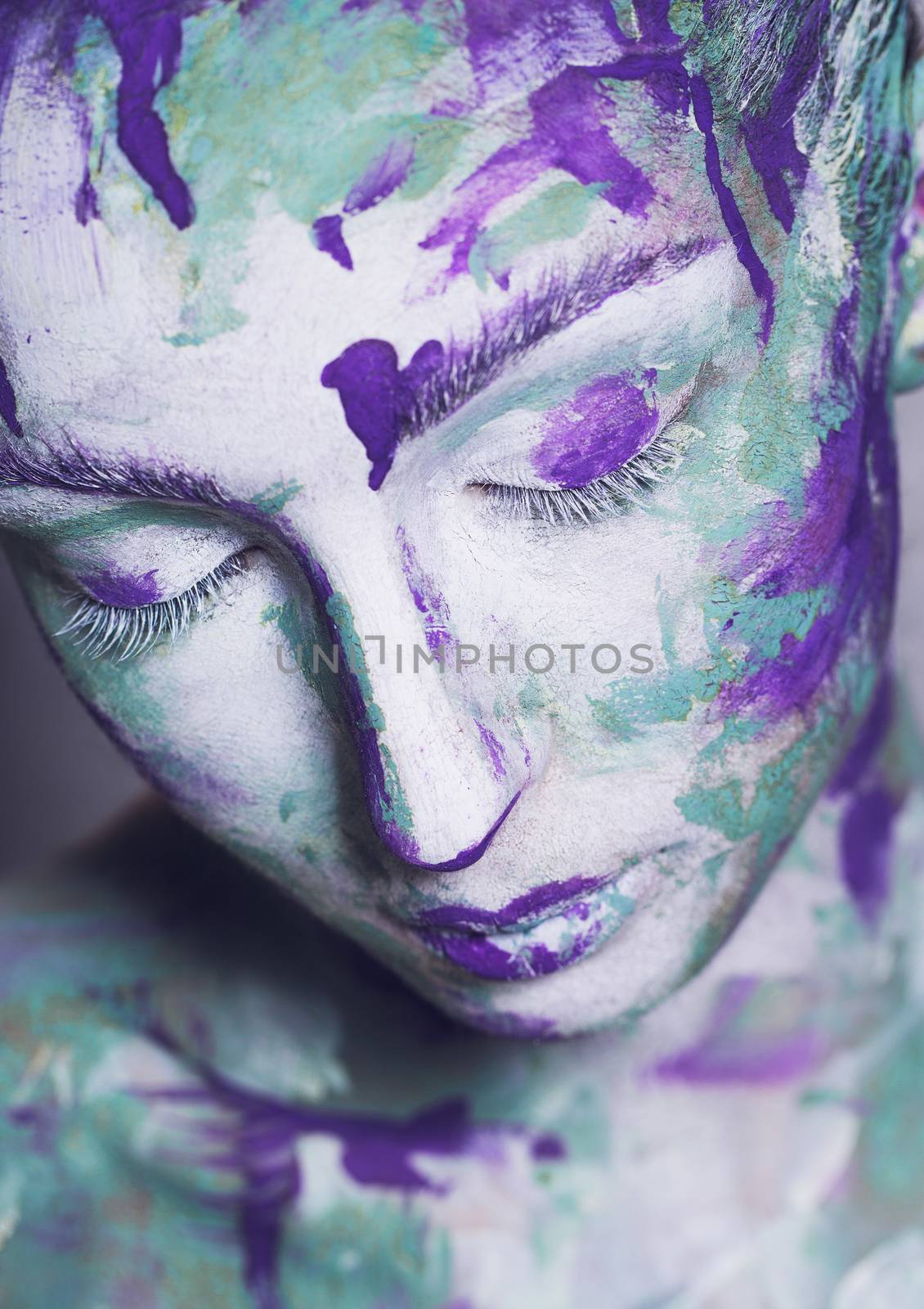 Portrait of young girl with creative make-up, fashion and beauty