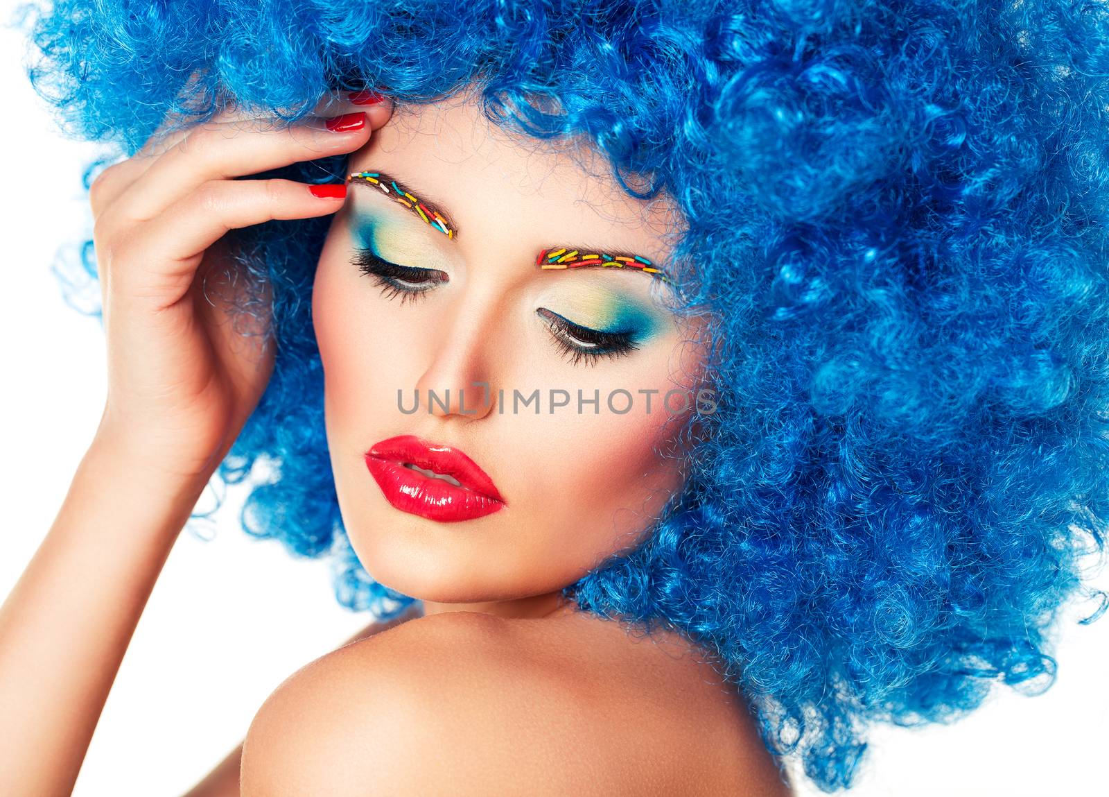 Portrait of a young beautiful girl with bright makeup in blue wi by vlad_star