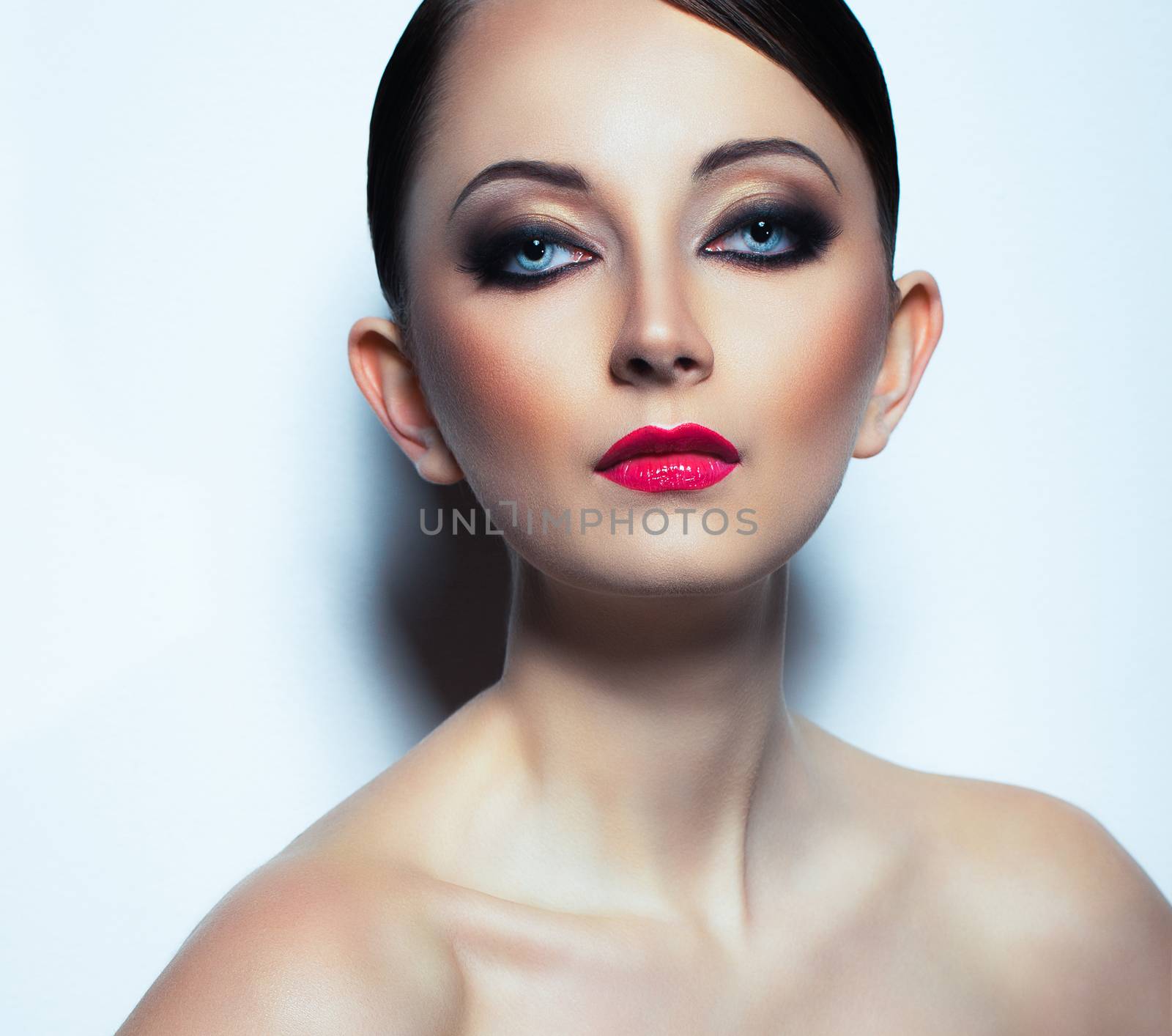 Portrait of a beautiful woman with a glamorous retro makeup by vlad_star