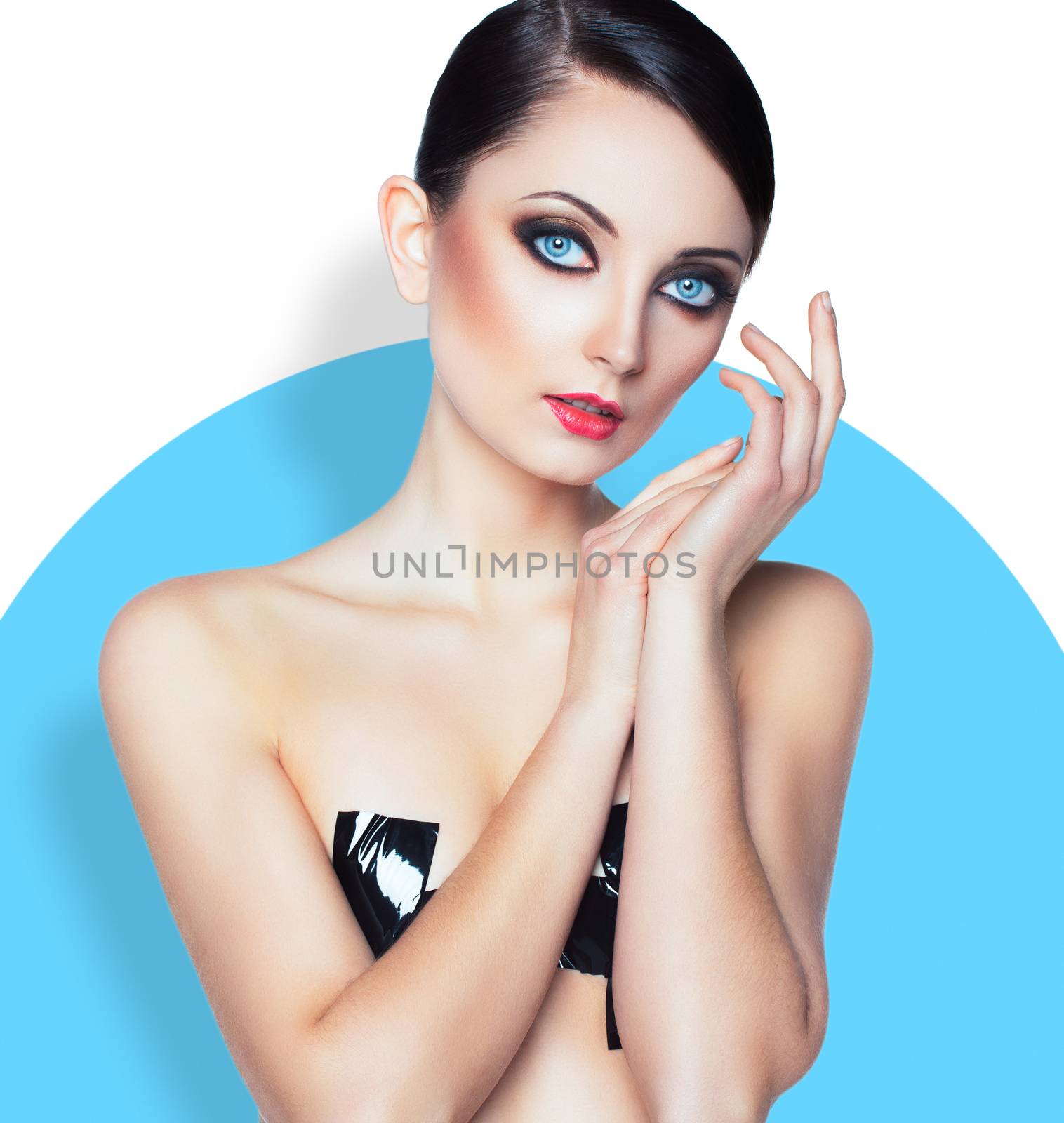 Portrait of a beautiful young woman aviator with a glamorous retro makeup