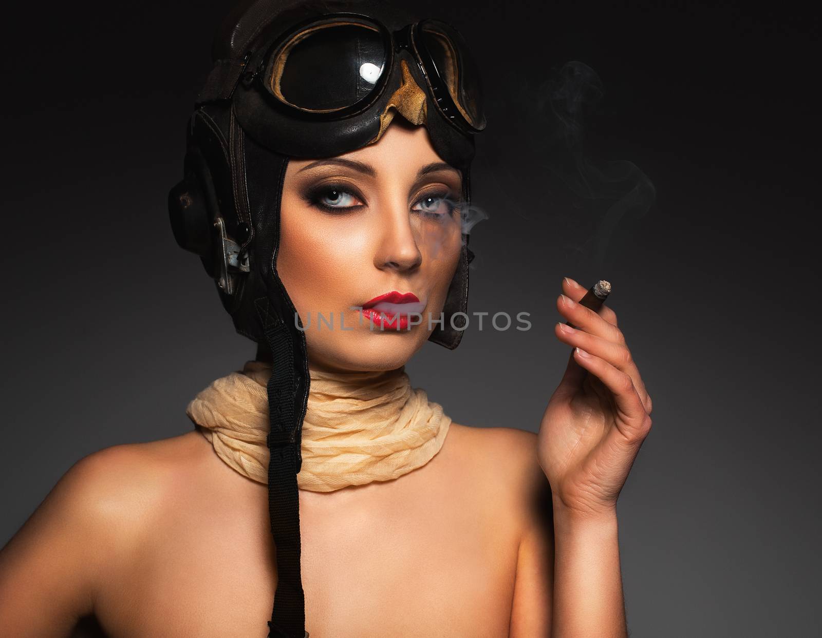 Portrait of a beautiful woman aviator with a glamorous retro mak by vlad_star