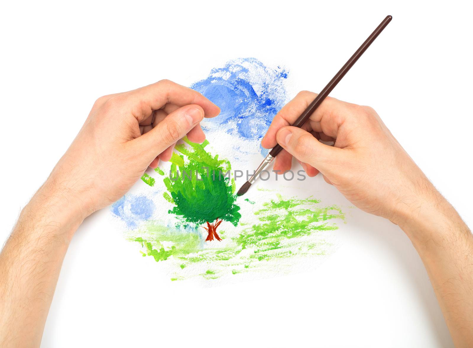 Human hands with brush painting nature landscape on white background