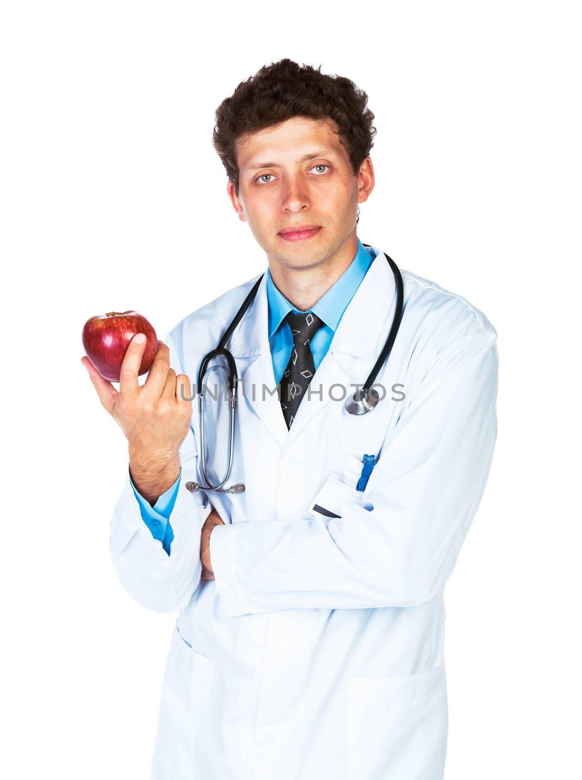 Portrait of a male doctor holding red apple on white background