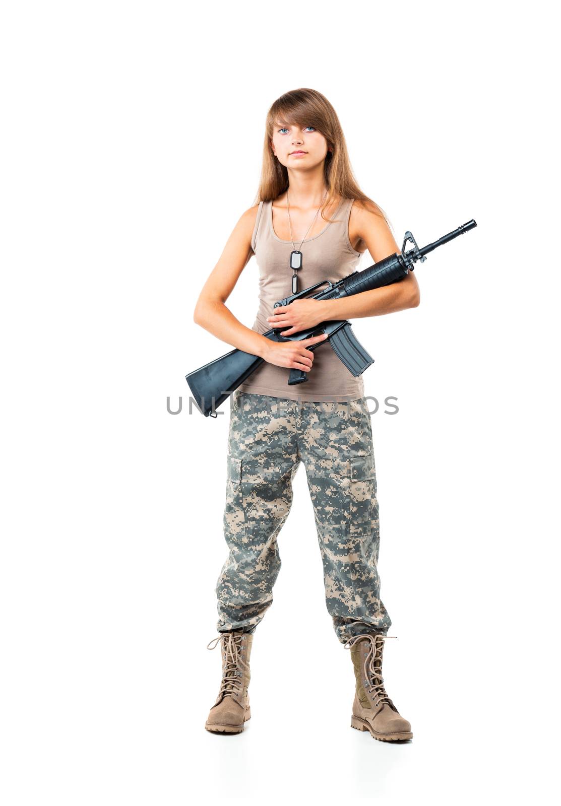 Soldier young beautyful girl dressed in a camouflage with a gun in his hand on white background