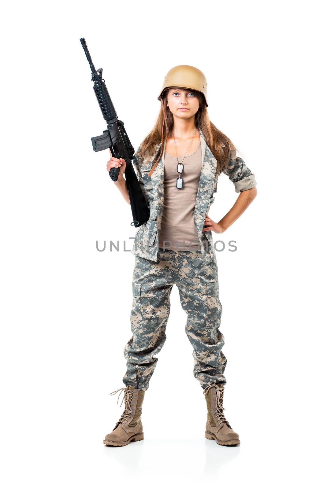 Soldier young beautiful girl dressed in a camouflage with a gun in his hand on white background