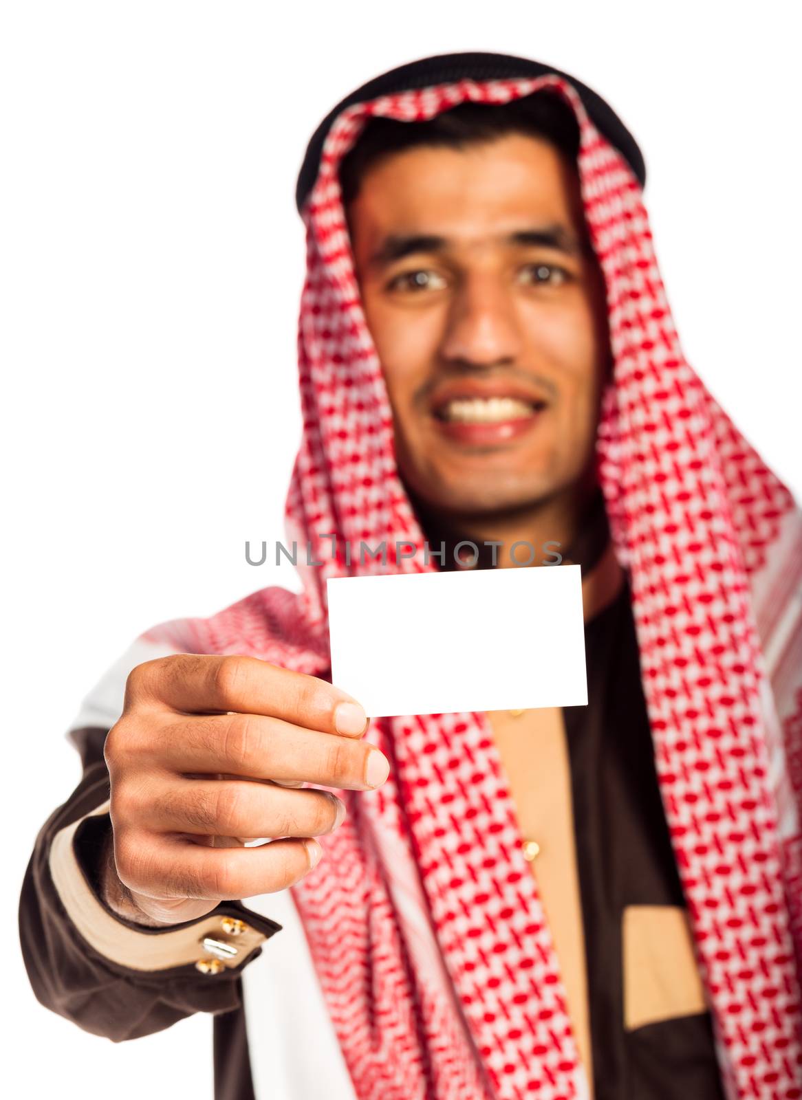 Young smiling arab showing business card in hand isolated on white background