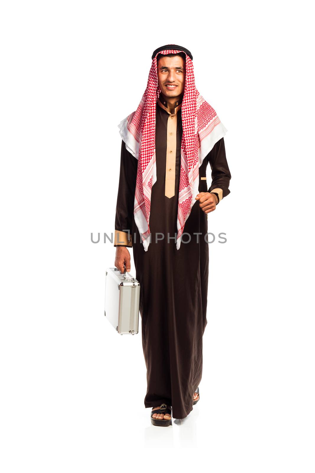 Young arab with a aluminum case isolated on white background