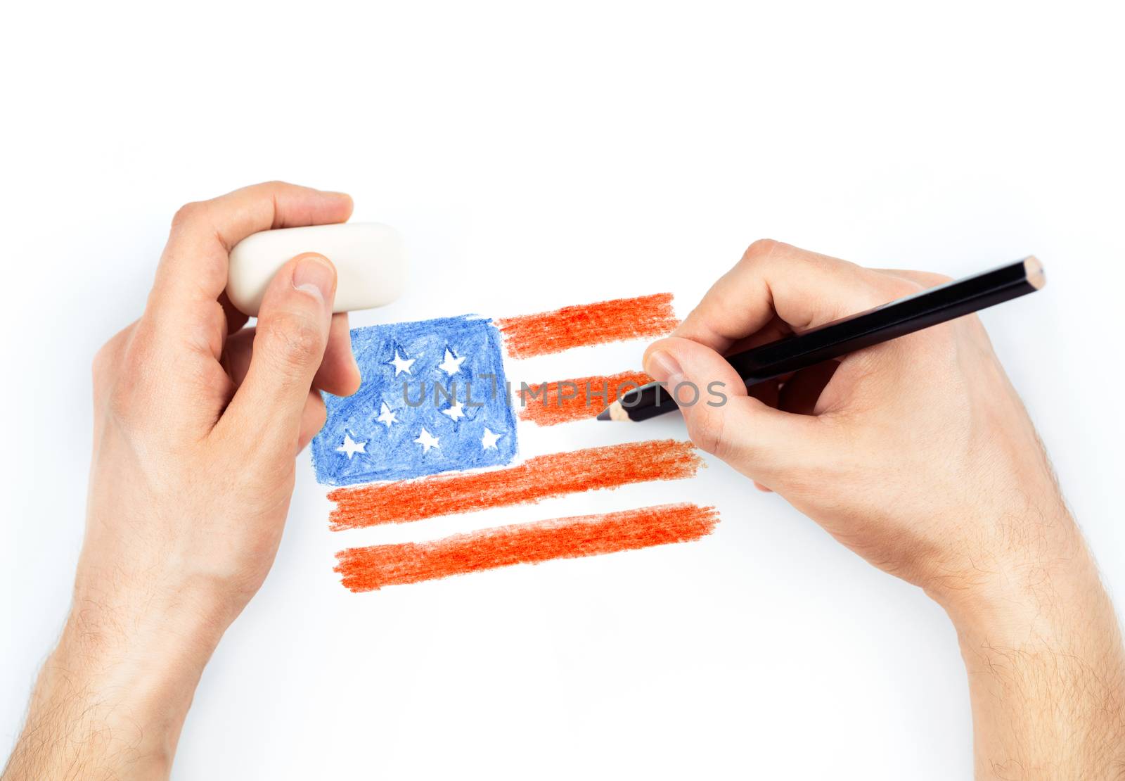 Man's hands with pencil draws flag of USA on white background