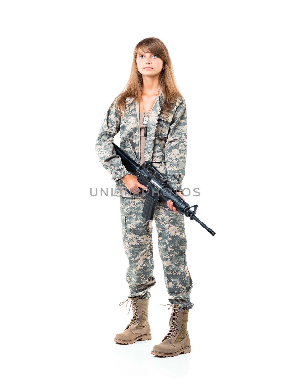 Soldier young beautyful girl dressed in a camouflage with a gun in his hand on white background