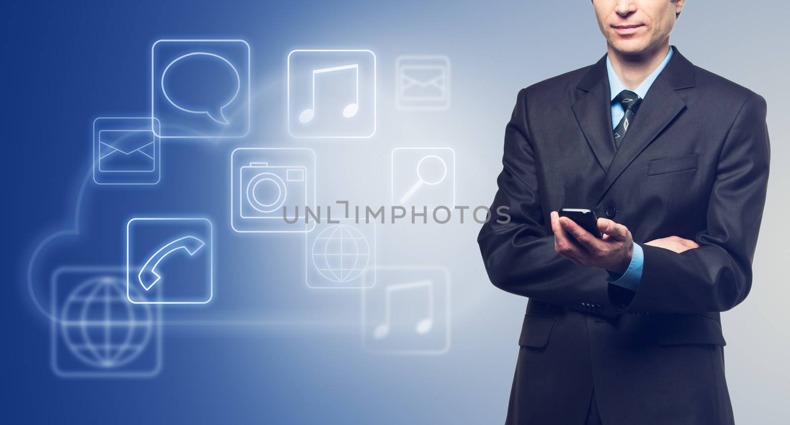 Businessman with touch screen phone and the cloud with applicati by vlad_star