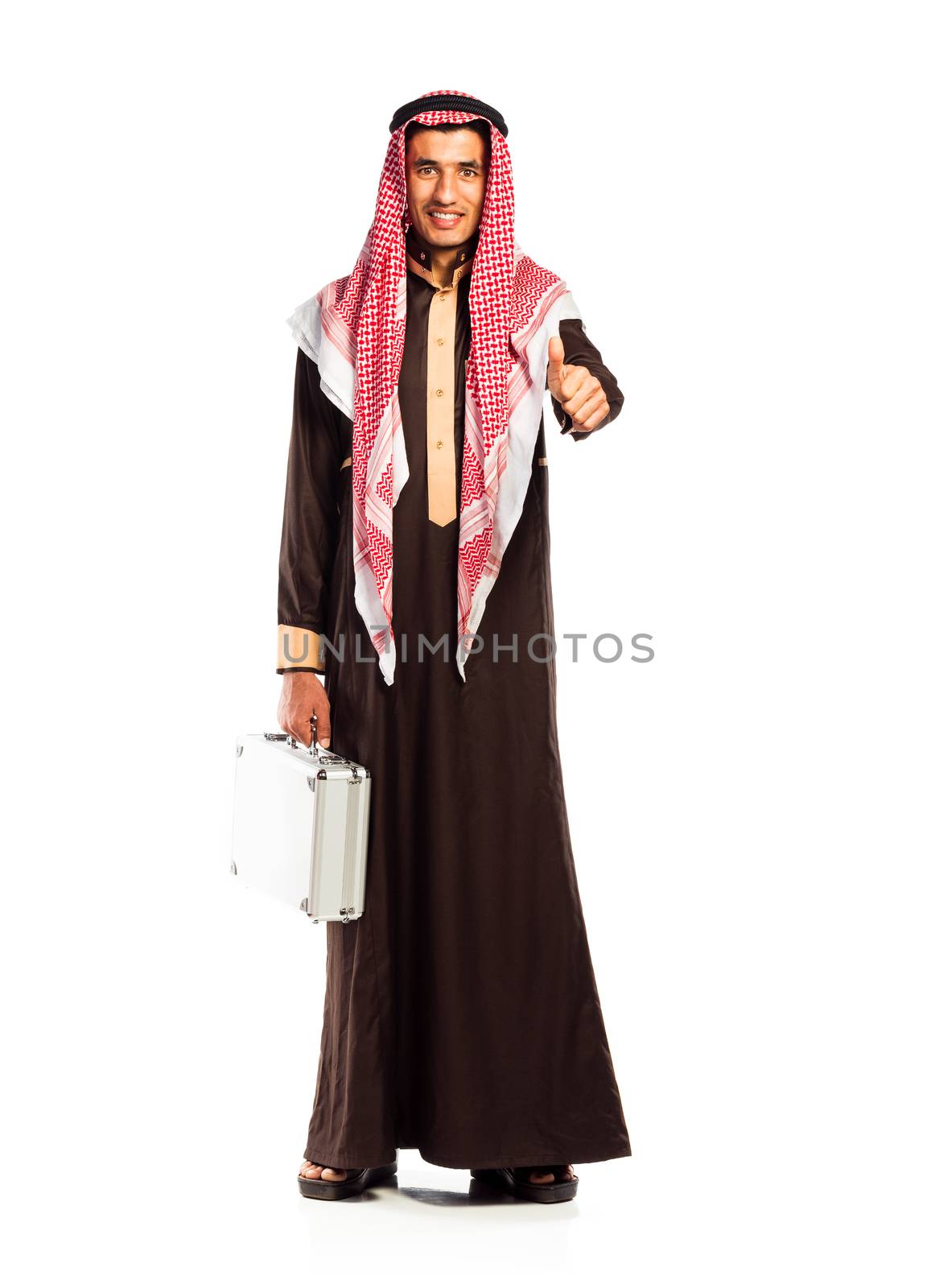 Young smiling arab with a aluminum case isolated on white background