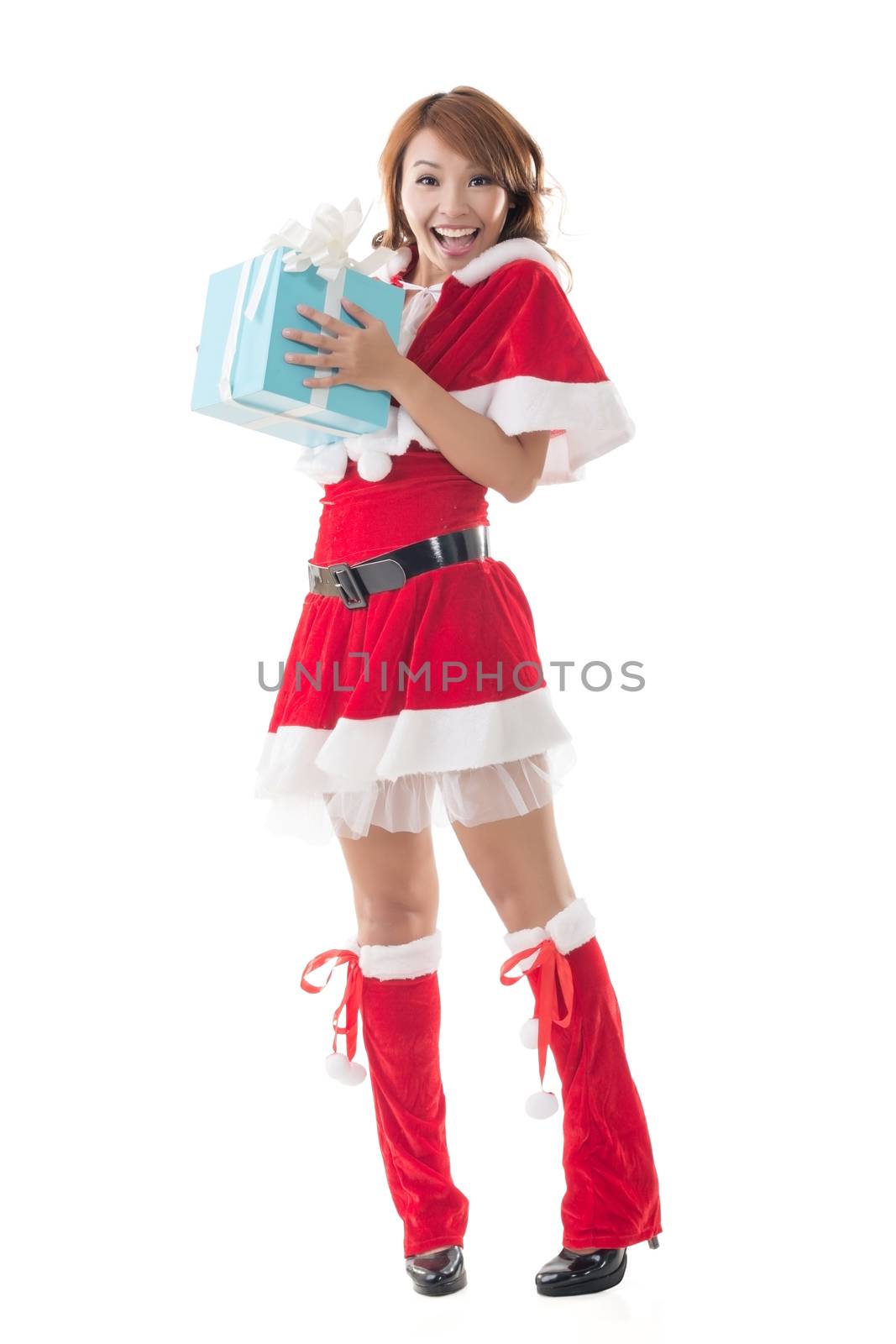 Smile happy Asian Christmas girl hold gift box by elwynn