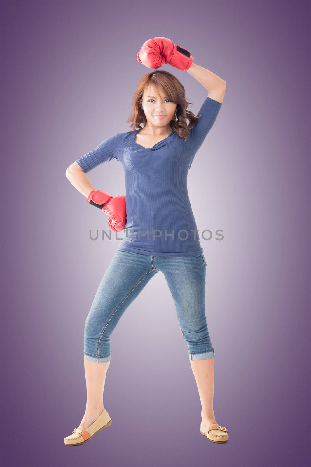 Fighting girl concept, rear view full length portrait of Asian isolated.