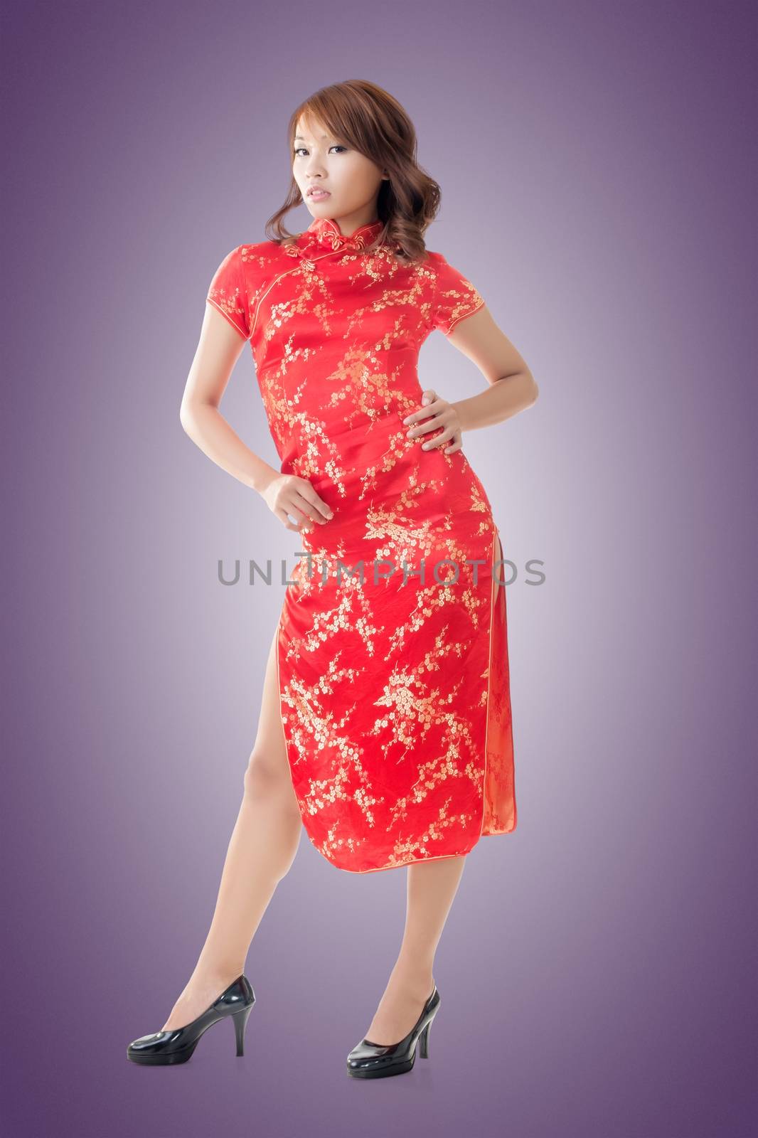 Chinese woman dress traditional cheongsam at New Year, full length portrait isolated.