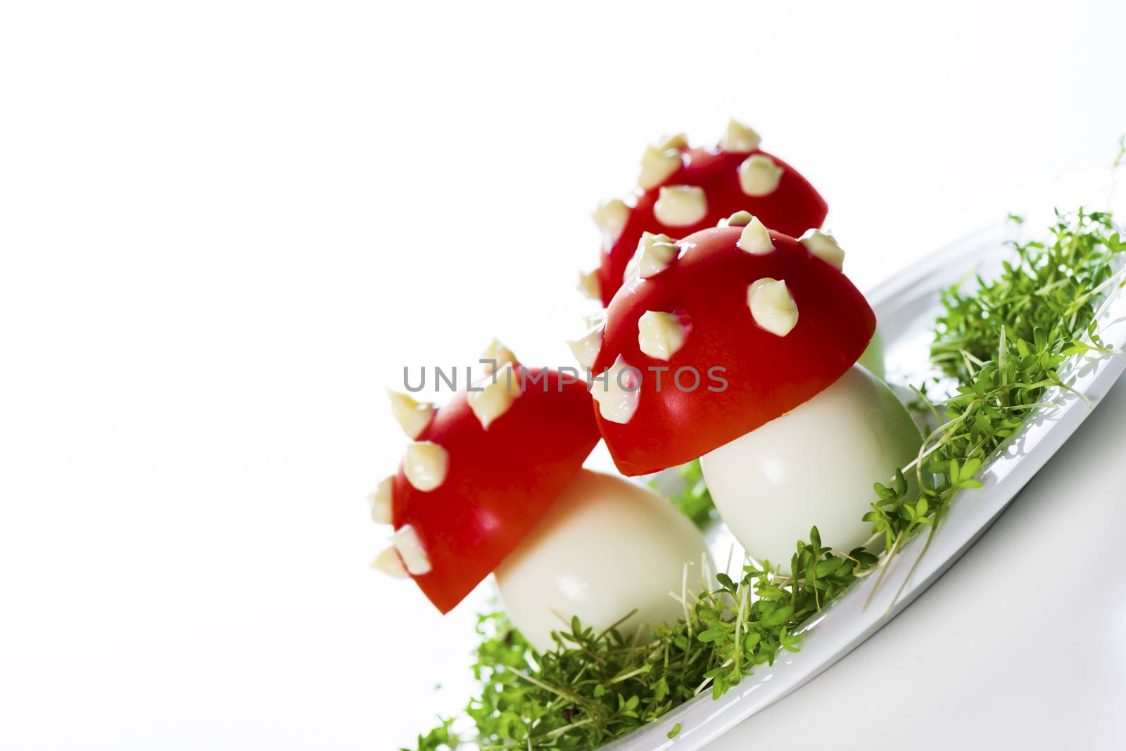 fly mushrooms made from boiled egg ,tomato and mayonnaise