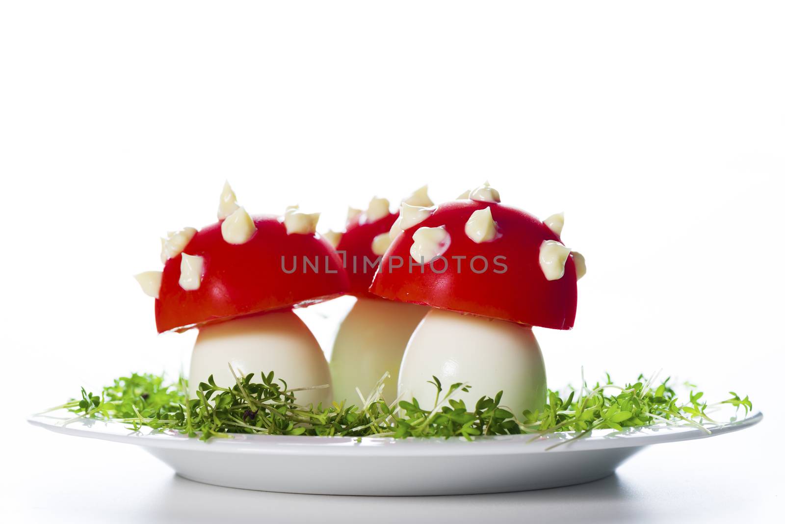 fly mushrooms made from boiled egg ,tomato and mayonnaise