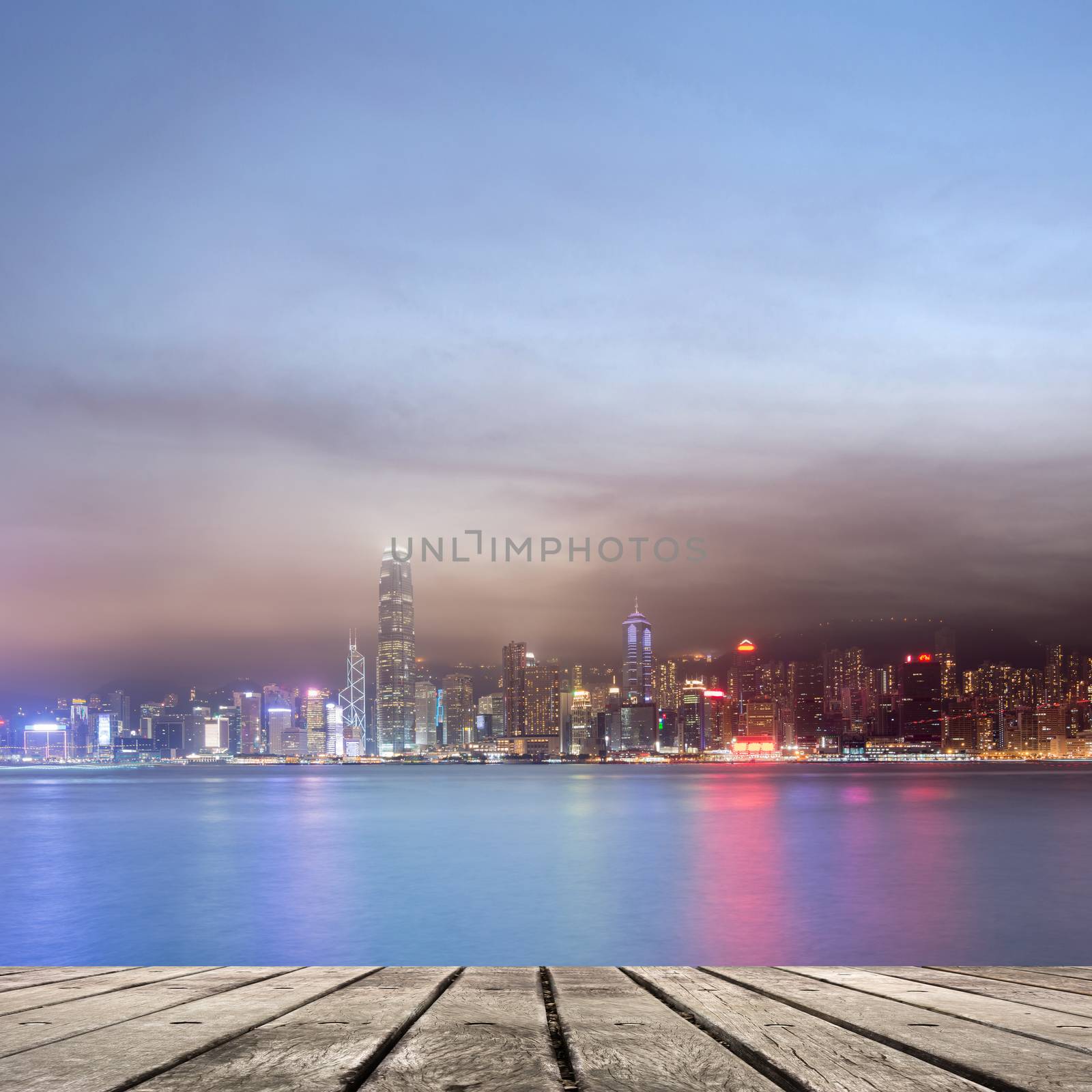 City night scenes of Victoria harbor in Hong Kong with copyspace on heaven.