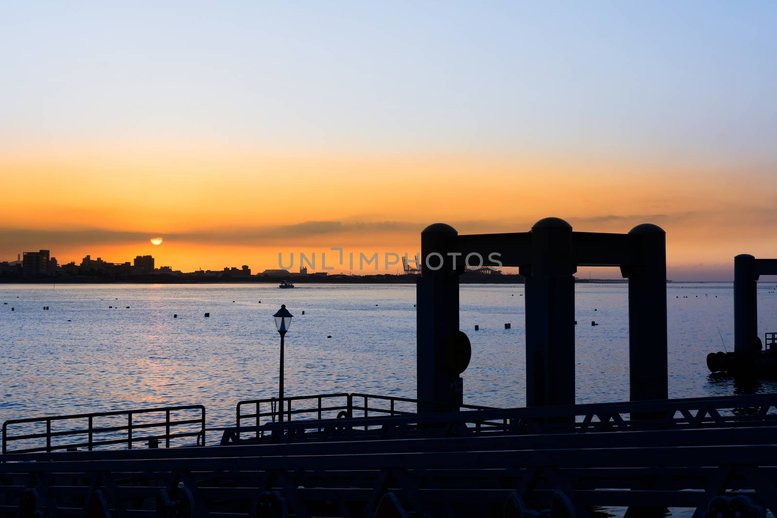Tamsui scenery with dock and boat in the sunset, Taipei, Taiwan, Asia.