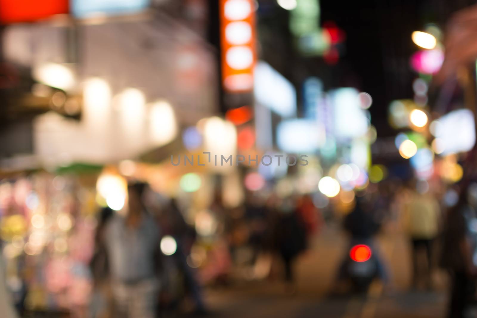 Abstract urban background with blurred buildings and street, shallow depth of focus.