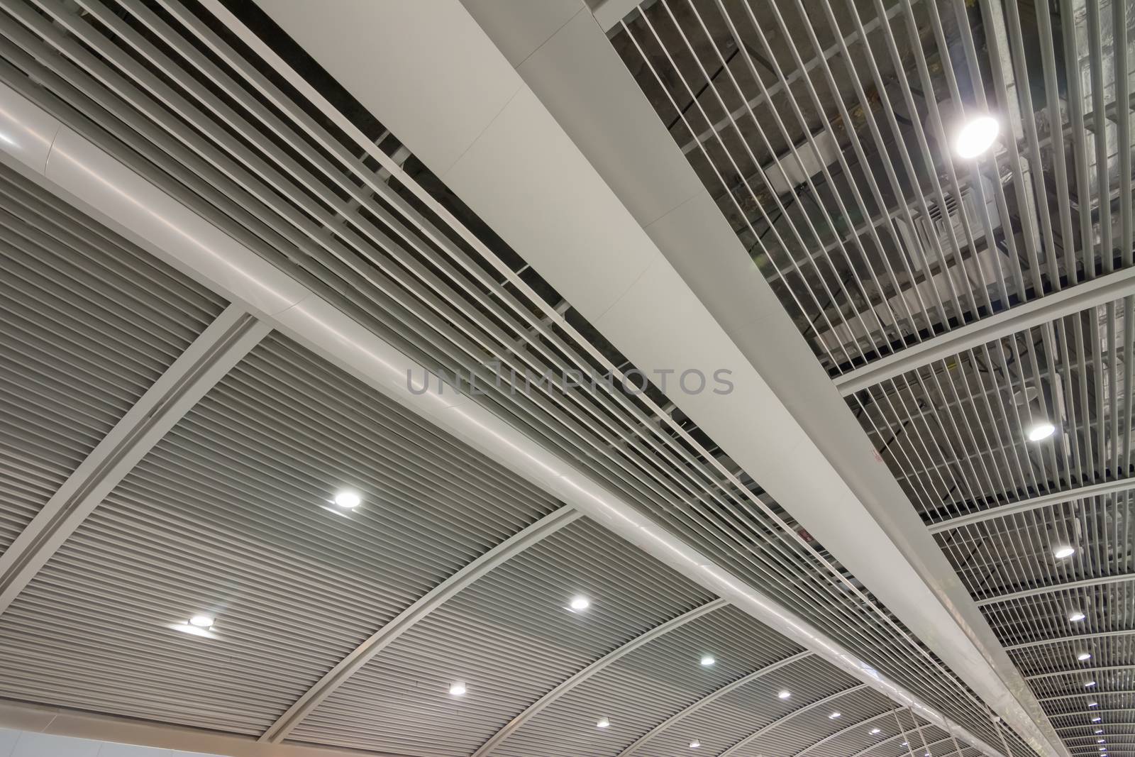 Beautiful geometric ceiling and the channel of building inside a station.