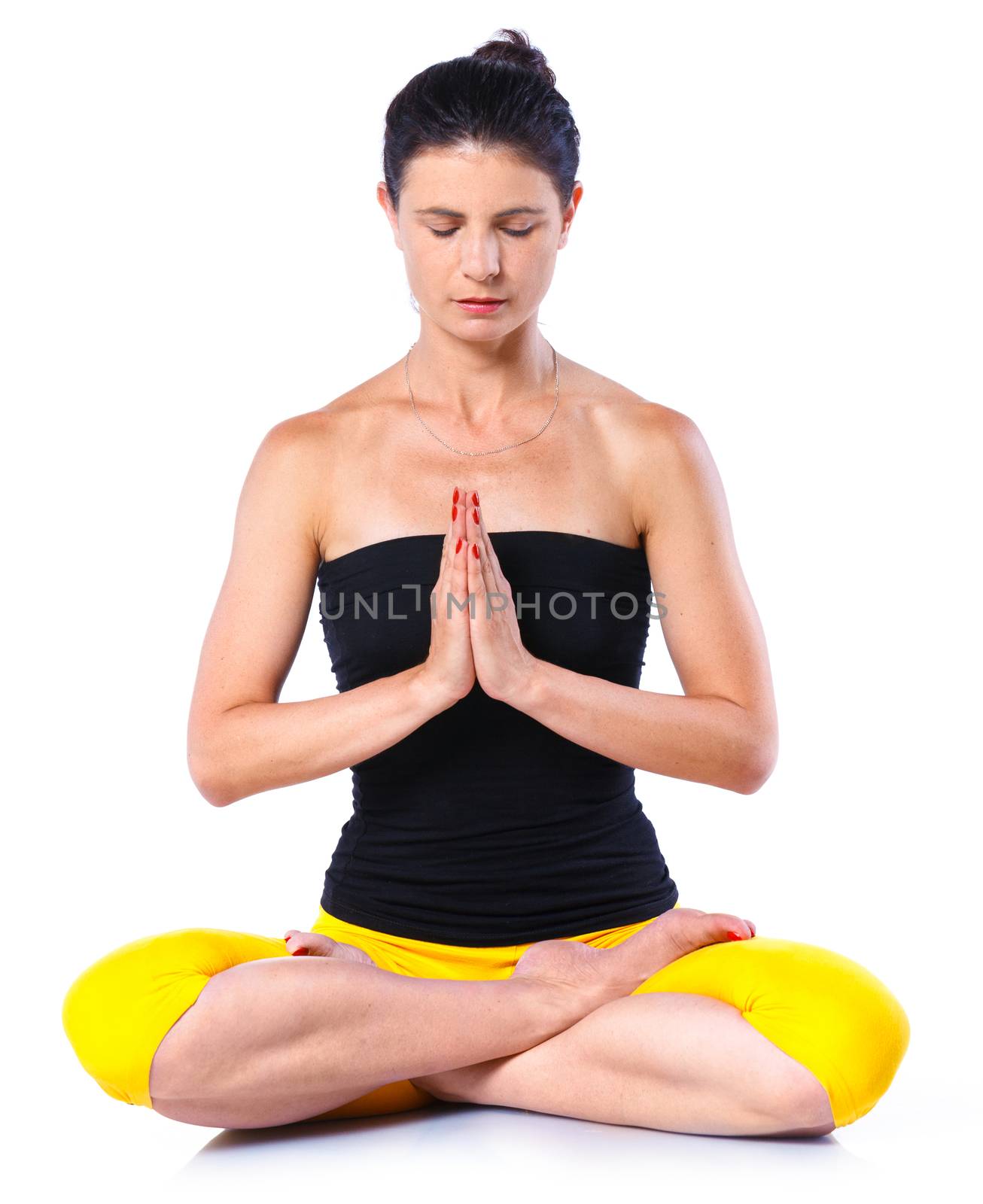 Young woman doing yoga. Isolated on white backgraund