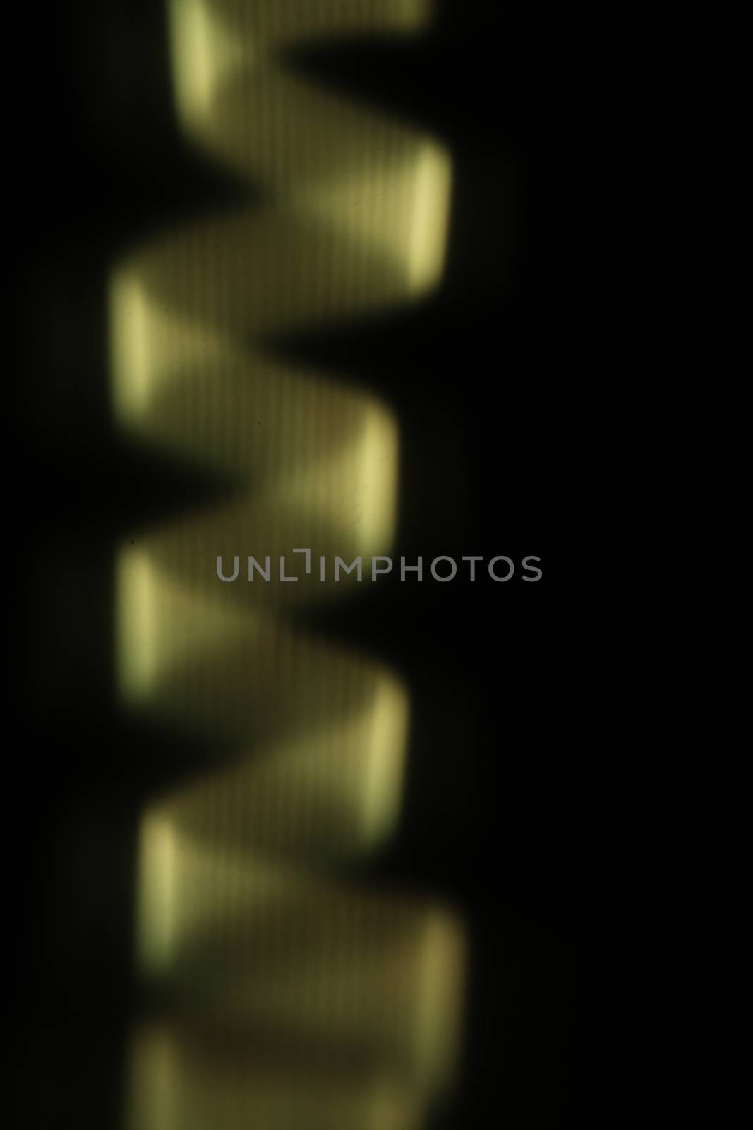 yellow color spiral shaped texture over black