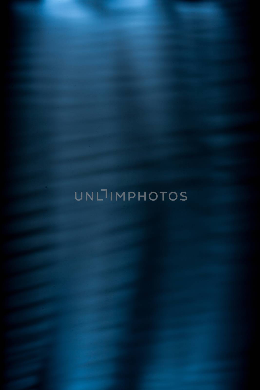 blue line shaped texture over black background