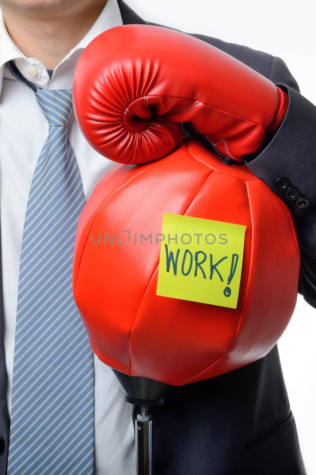 businessman with boxing glove ready to fight with work, business by numskyman