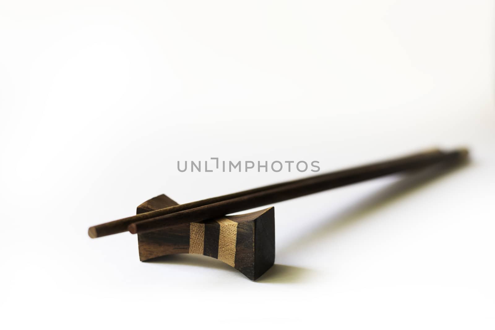set of chinese chopsticks on a white background by enrico.lapponi