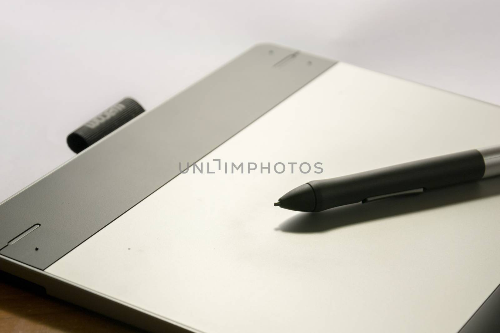 Close-up of a graphic tablet with his pen tool by enrico.lapponi