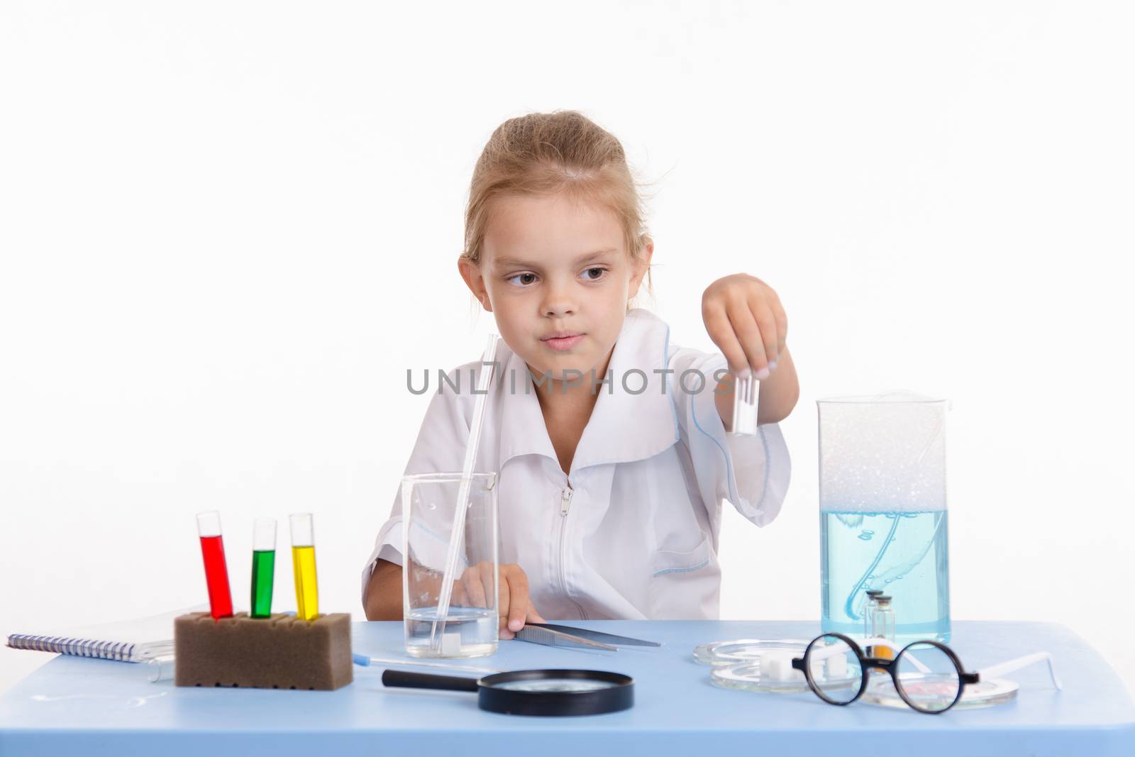Pupil at a school desk in chemistry class