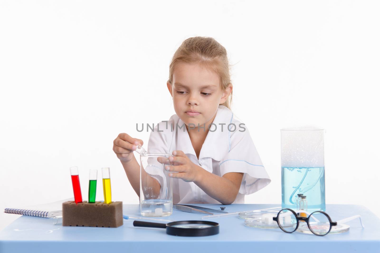 Pupil at a school desk in chemistry class