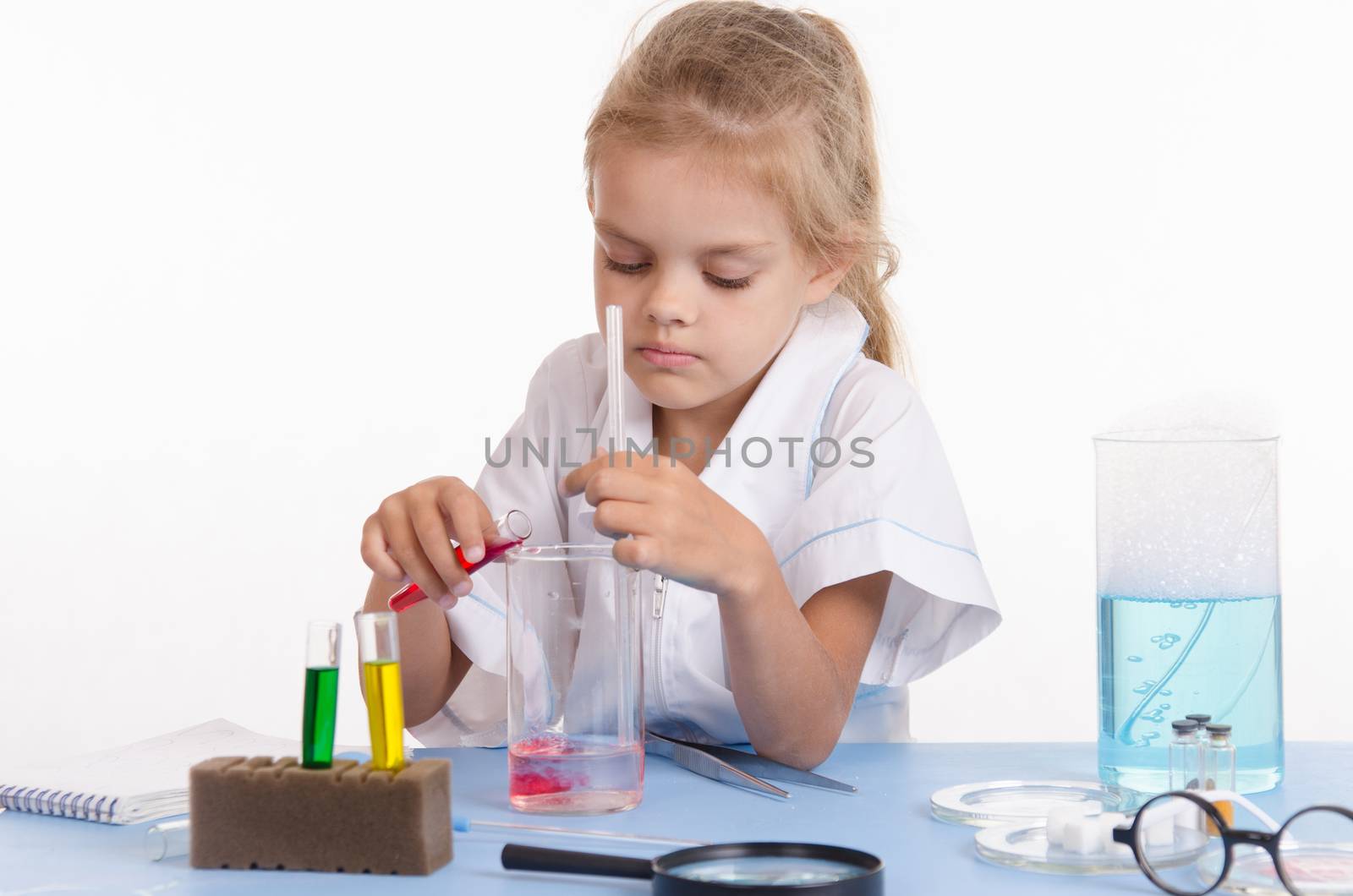 Pupil at a school desk in chemistry class