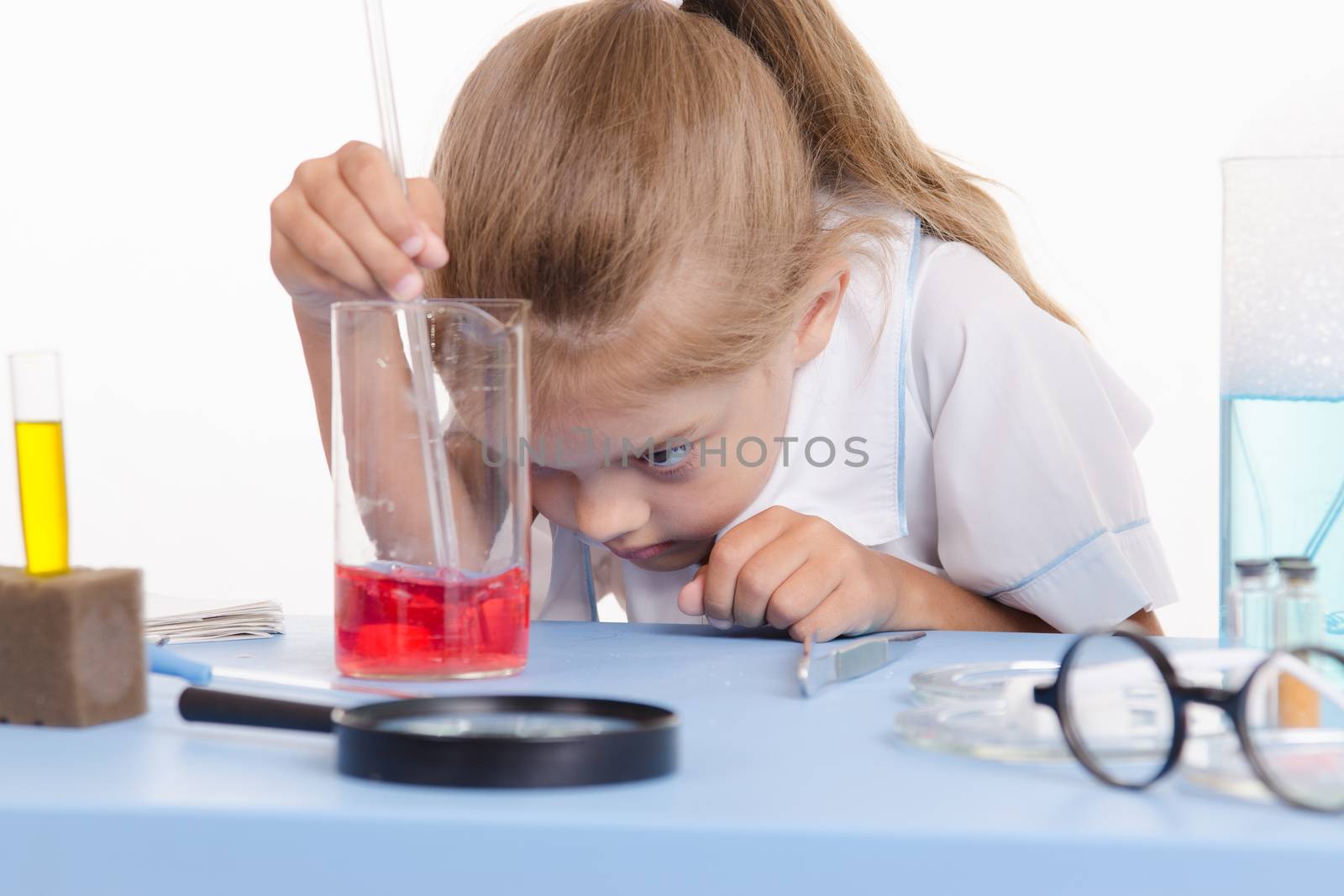 Pupil at a school desk in chemistry class