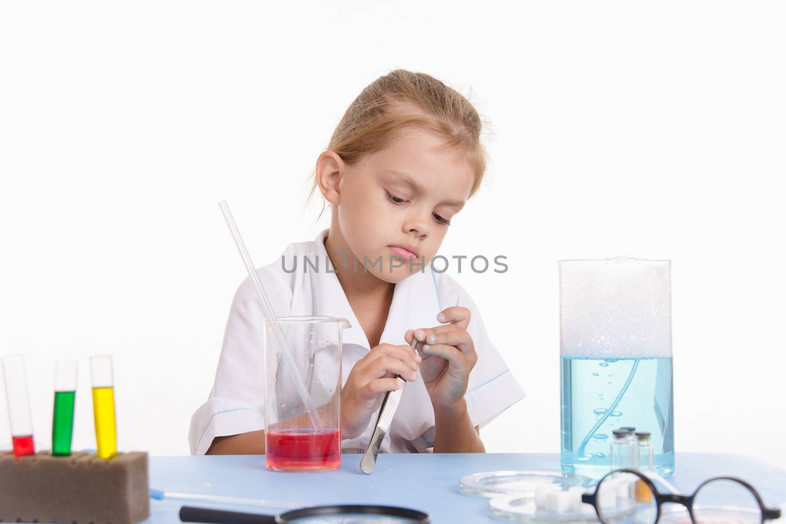 Pupil at a school desk in chemistry class
