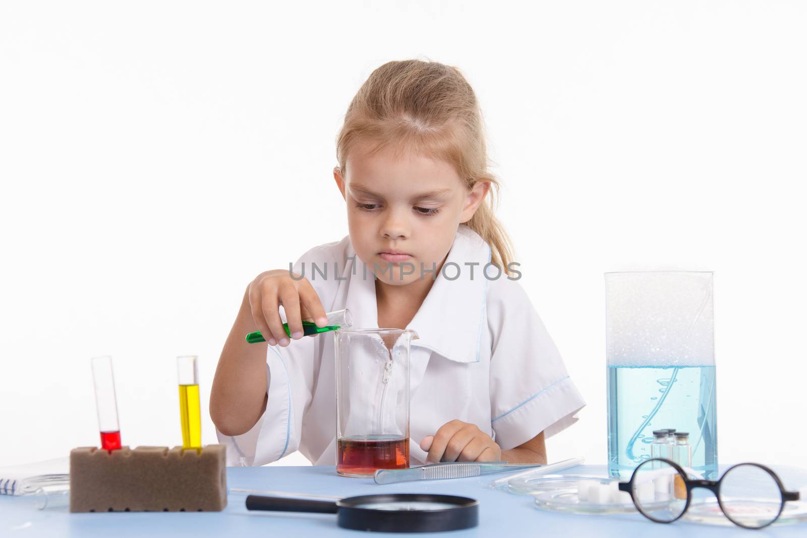 Pupil at a school desk in chemistry class