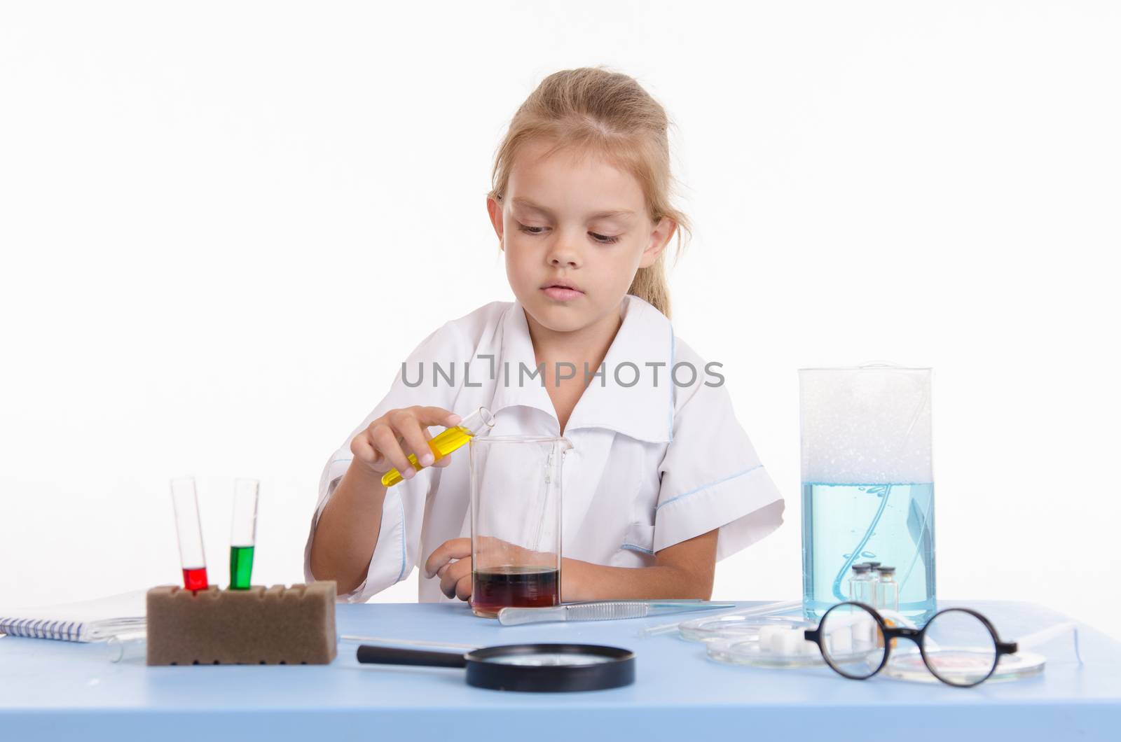 Pupil at a school desk in chemistry class
