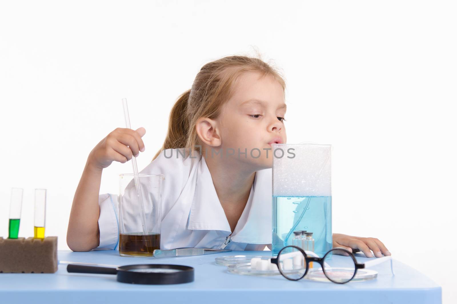 Pupil at a school desk in chemistry class