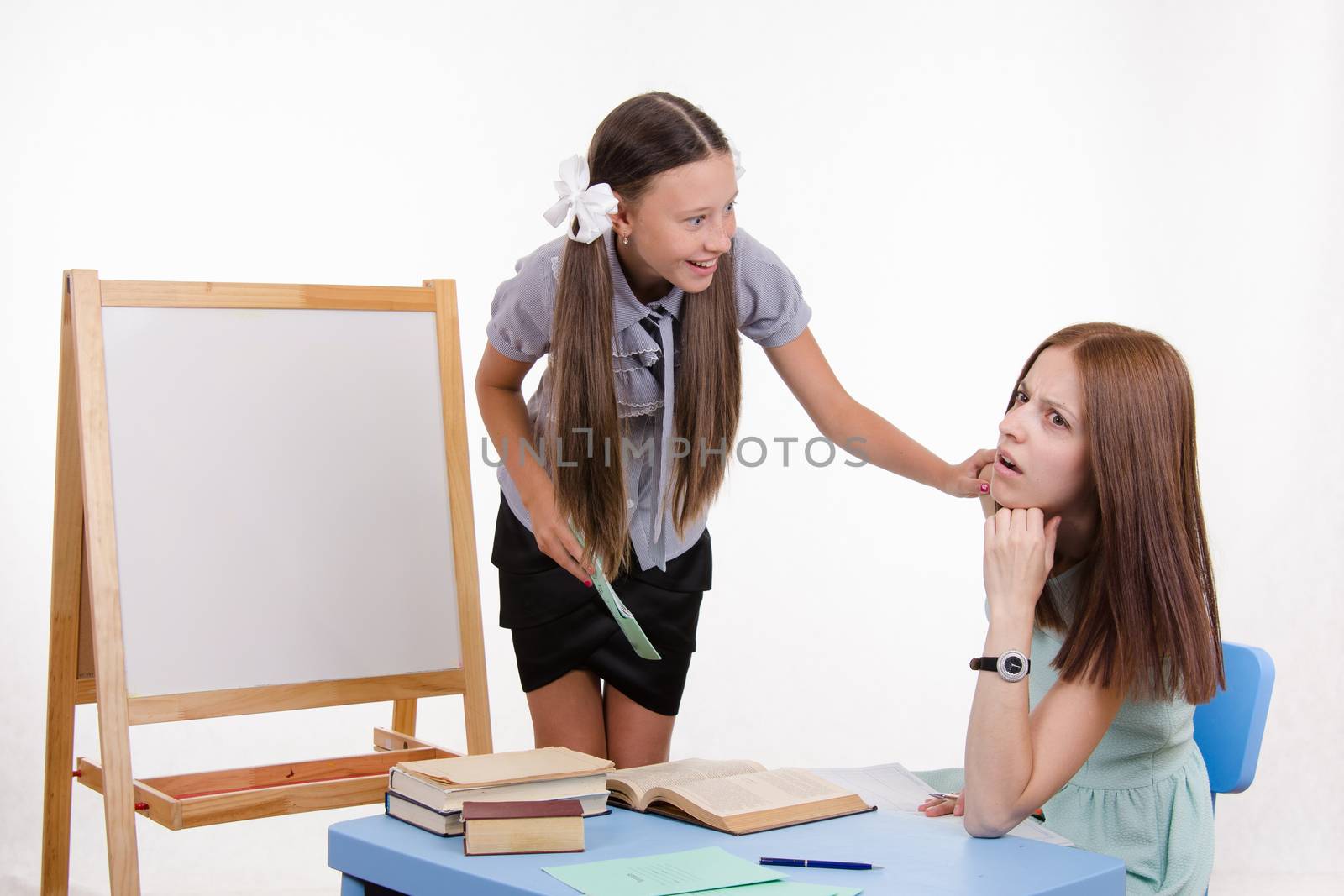 The teacher went to sleep as the student answered at the blackboard