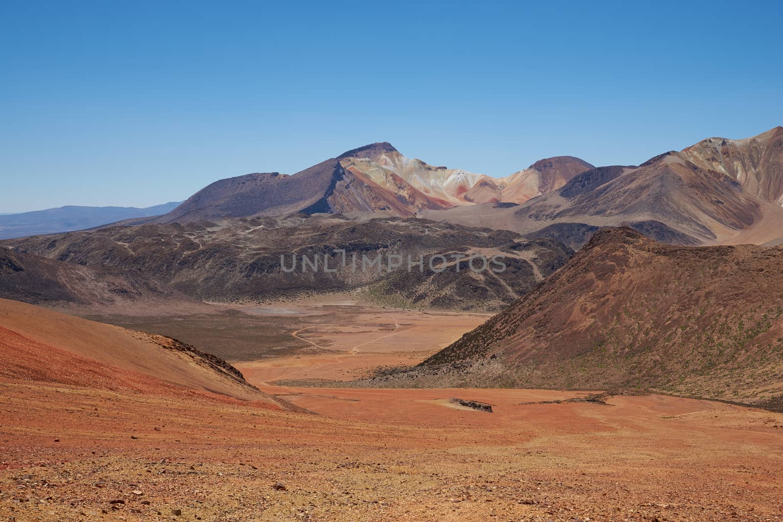 Colourful mountain landscape at Suriplaza in the Atacama Desert of north east Chile. The altitude is in excess of 4,000 metres.