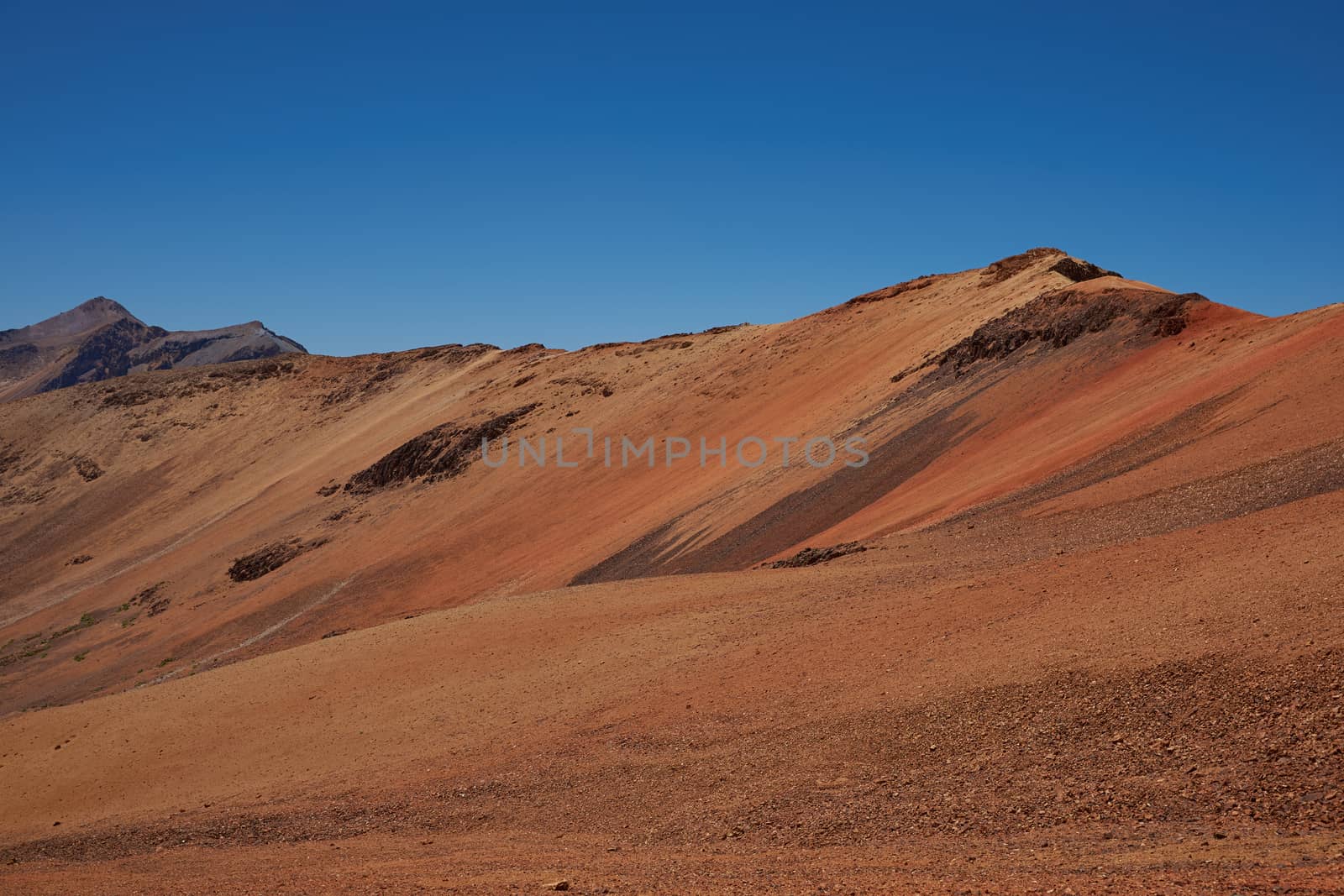 Colourful mountain landscape at Suriplaza in the Atacama Desert of north east Chile. The altitude is in excess of 4,000 metres.