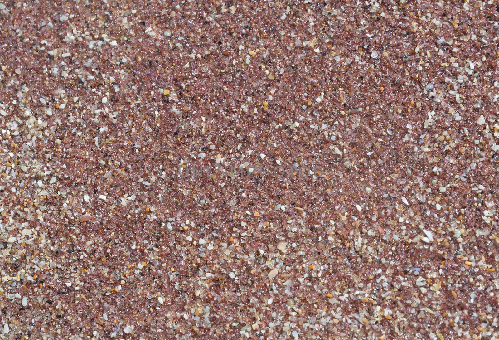 Crystal sand background texture. Crystal sand with glittering natural gemstone content in miniature, Southern Province, Sri Lanka, Asia.