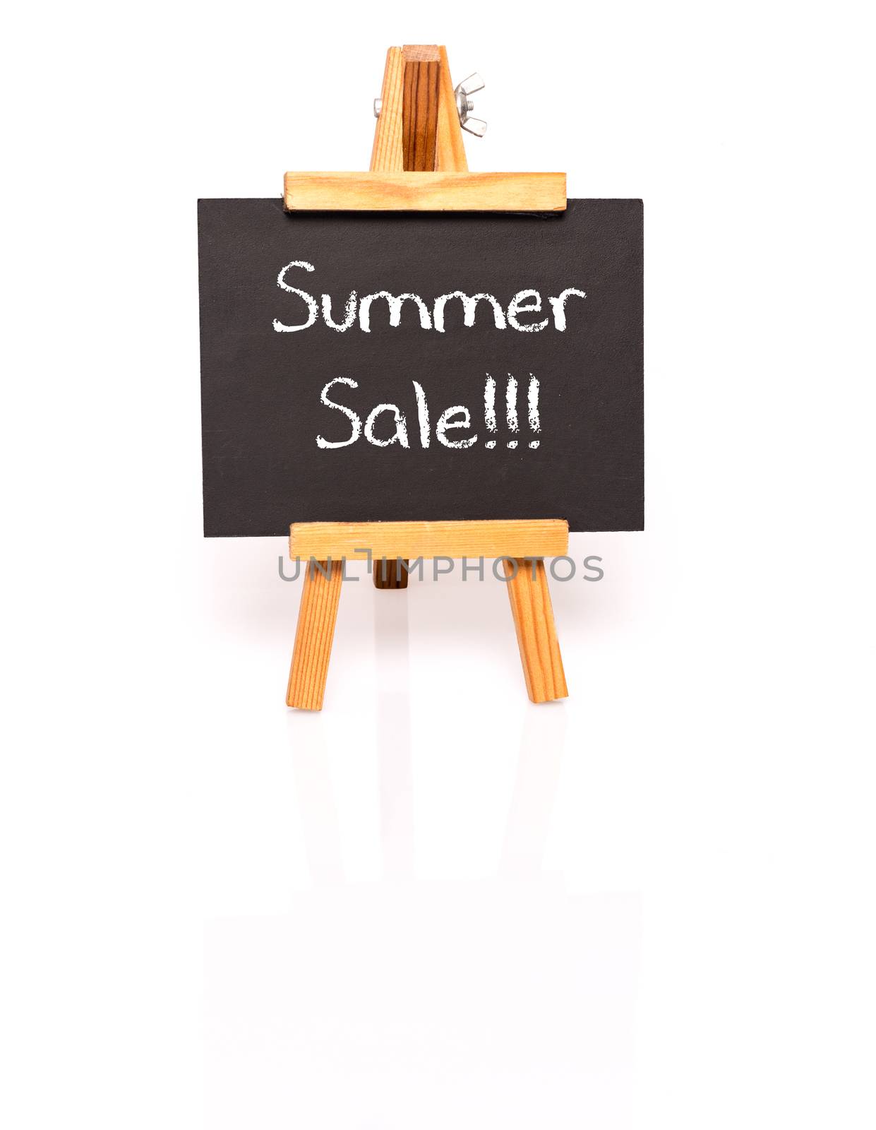 Summer Sale. Blackboard with text and easel. Photo on white background with shadow and reflection.