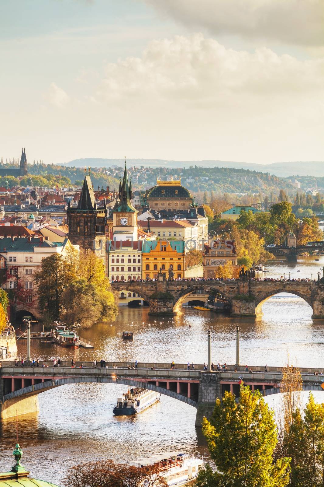 Overview of old Prague with Charles bridge before sunset