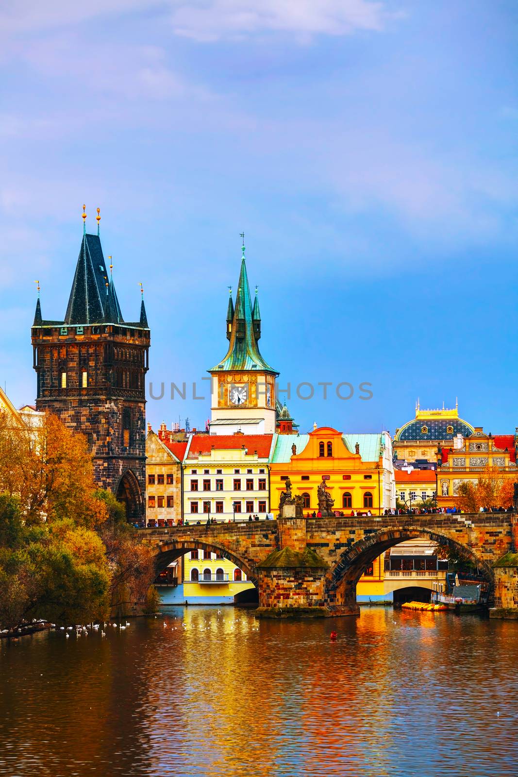 The Old Town Charles bridge tower in Prague in the evening