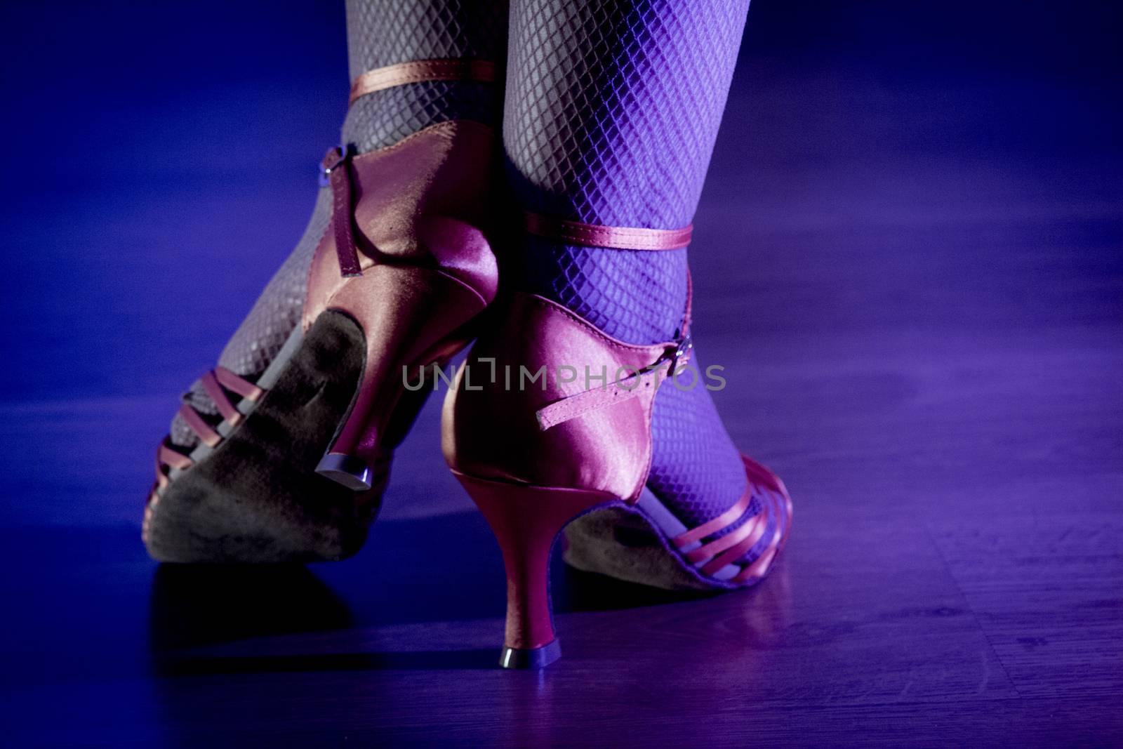 Woman dancing in heels.