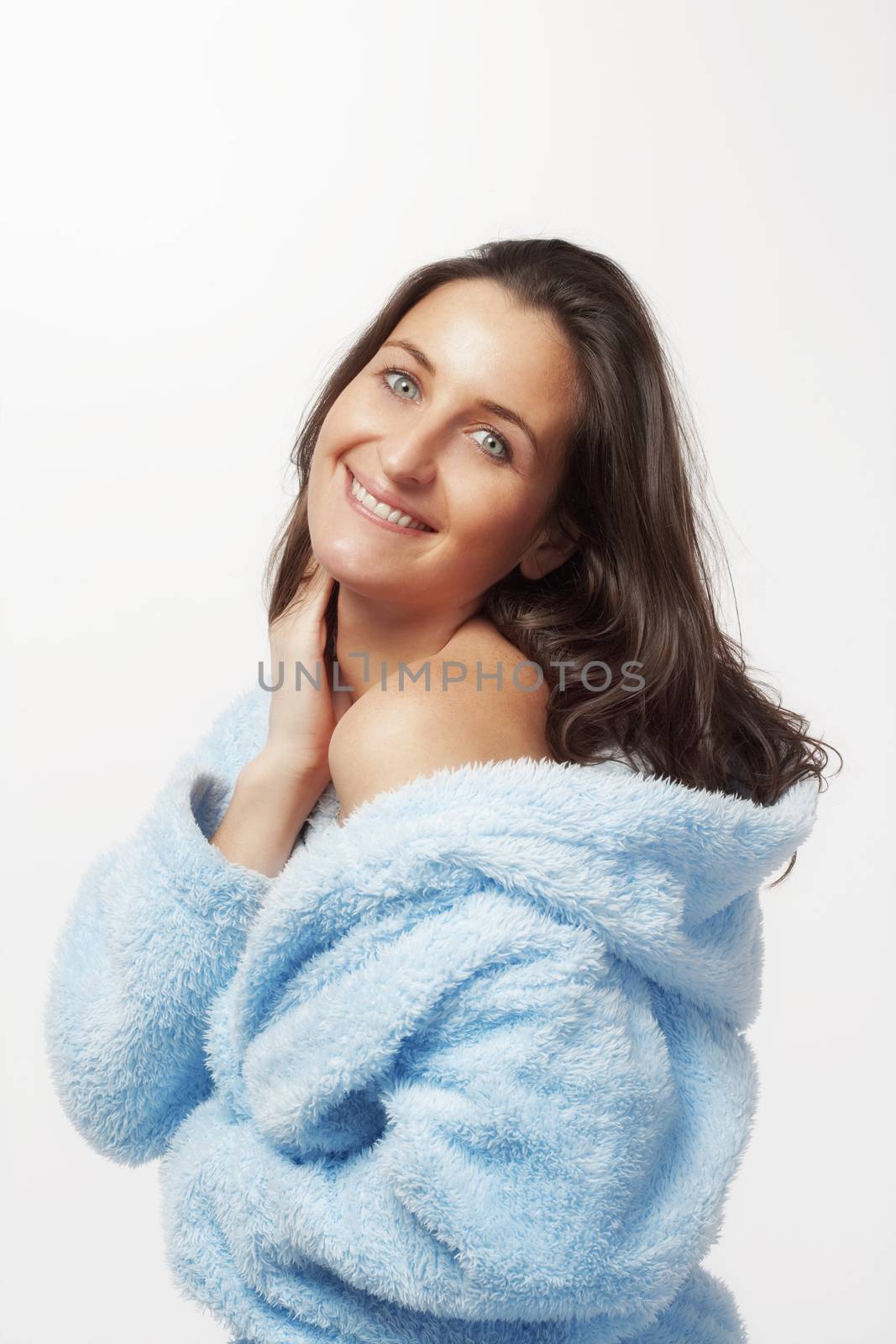 woman in bathrobe by courtyardpix