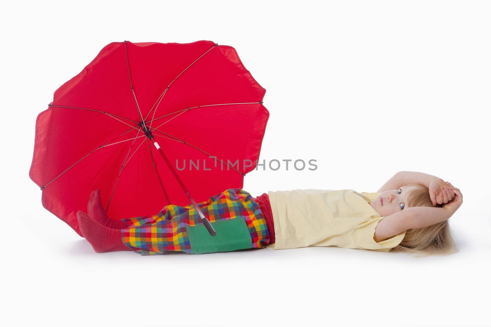 boy with red umbrella by courtyardpix